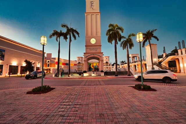 view of outdoor building at dusk