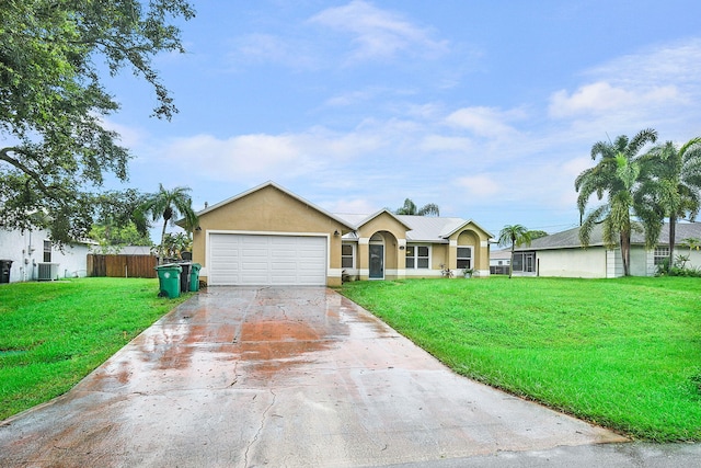 ranch-style home featuring a front lawn, central AC, and a garage