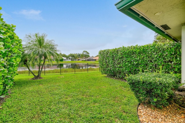 view of yard with a water view