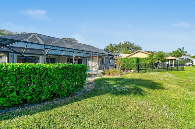 view of yard featuring a lanai