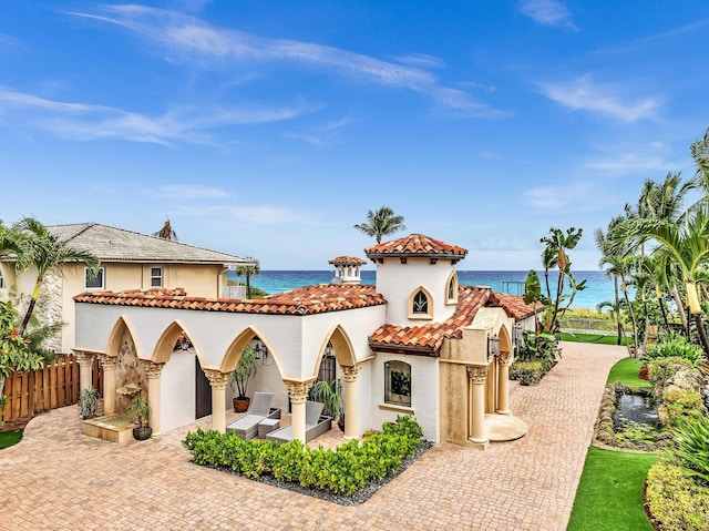 view of front of house featuring a water view