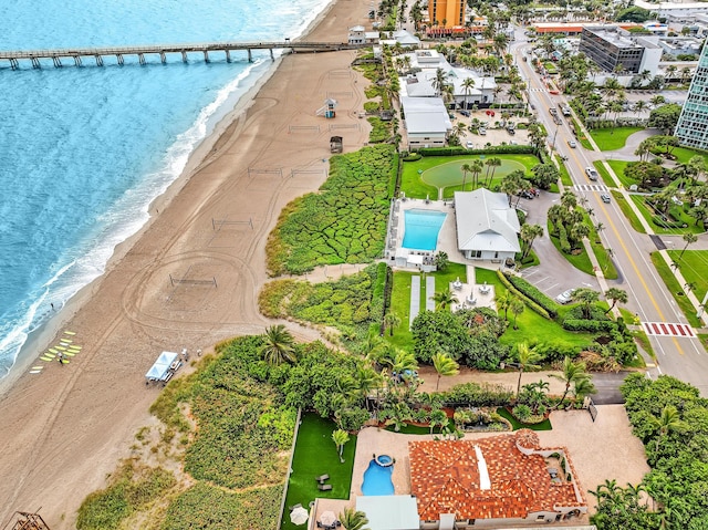 bird's eye view featuring a view of the beach and a water view