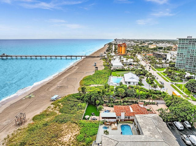 aerial view with a beach view and a water view