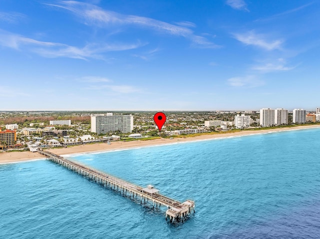 drone / aerial view with a view of the beach and a water view