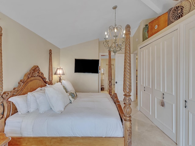 bedroom featuring a notable chandelier, a closet, and lofted ceiling