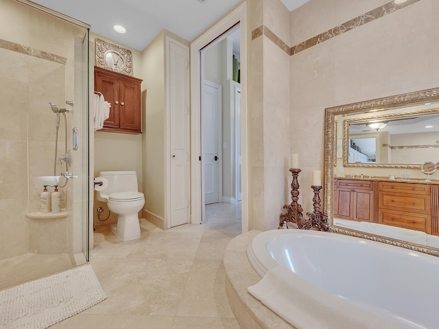 full bathroom with independent shower and bath, vanity, tile patterned flooring, and toilet