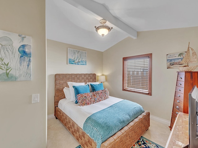 bedroom with vaulted ceiling with beams