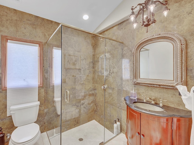 bathroom with vanity, lofted ceiling, an enclosed shower, tile walls, and toilet