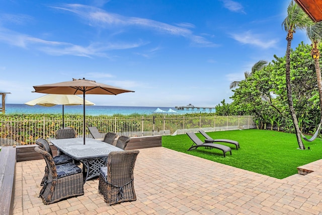 view of patio featuring a water view