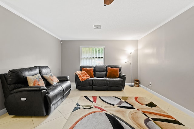 tiled living room with ceiling fan and ornamental molding