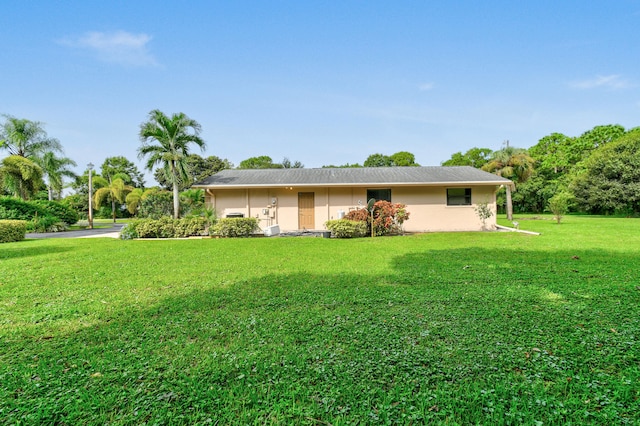 exterior space with a front yard