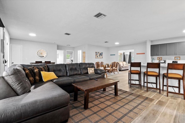 living room with light wood-type flooring