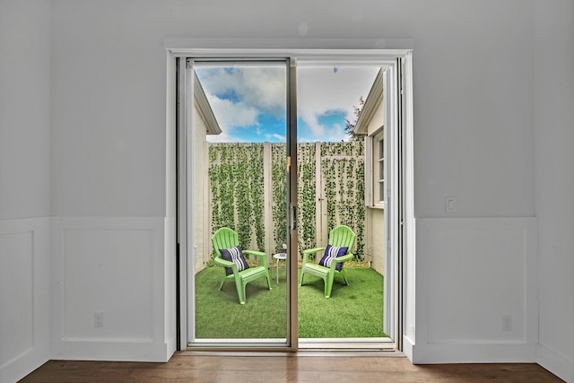 doorway featuring hardwood / wood-style floors