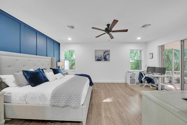 bedroom featuring ceiling fan and light wood-type flooring