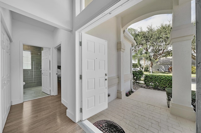 foyer entrance featuring hardwood / wood-style floors