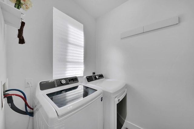 laundry room with washer and dryer