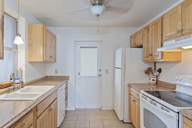 kitchen featuring pendant lighting, light brown cabinets, light tile patterned floors, sink, and white appliances