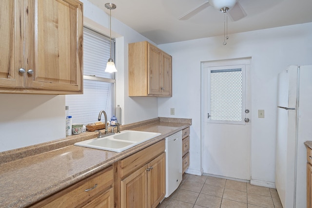 kitchen with white appliances, light tile patterned floors, pendant lighting, ceiling fan, and sink