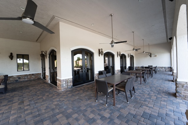 view of patio / terrace featuring french doors and ceiling fan