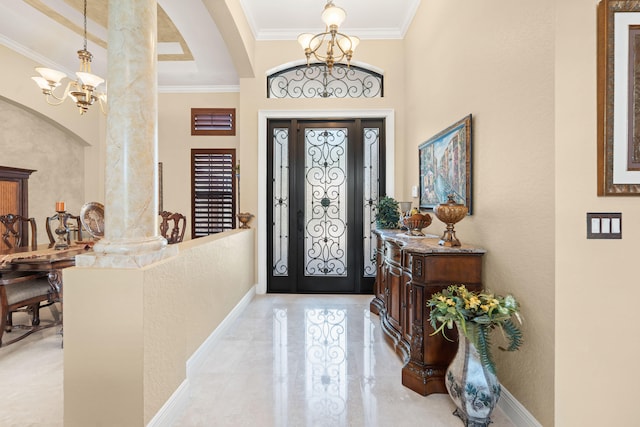 foyer featuring a notable chandelier and ornamental molding