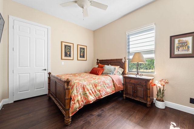 bedroom with dark wood-type flooring and ceiling fan