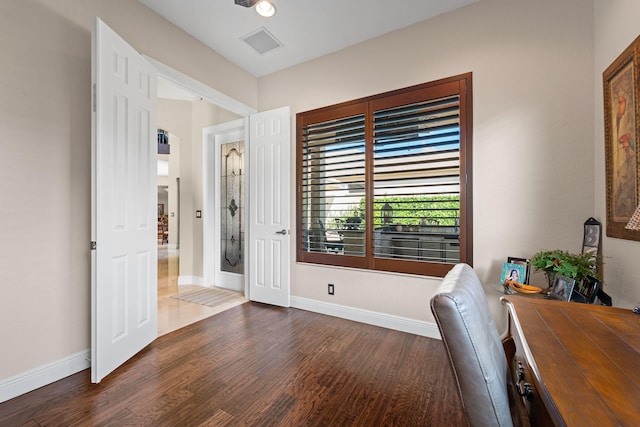 office space featuring dark hardwood / wood-style flooring