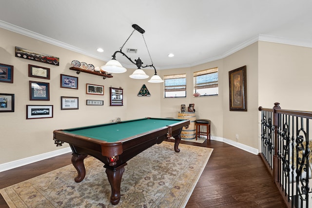 recreation room with dark wood-type flooring, ornamental molding, and pool table