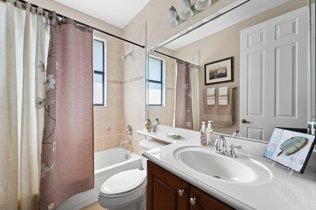 full bathroom with toilet, shower / bathtub combination with curtain, and vanity