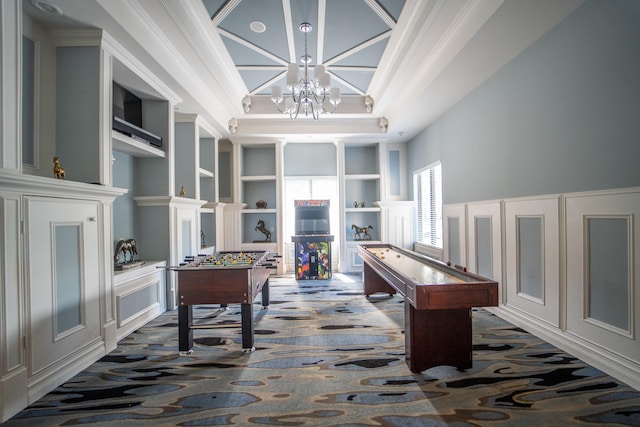 game room featuring a towering ceiling, crown molding, built in features, and carpet