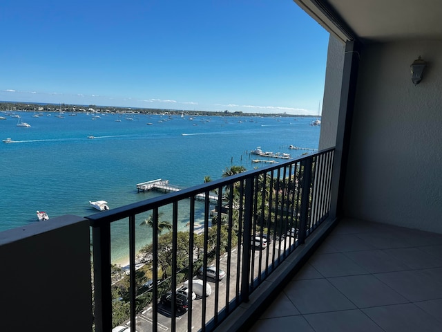 balcony featuring a water view