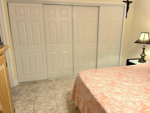 bedroom with multiple closets