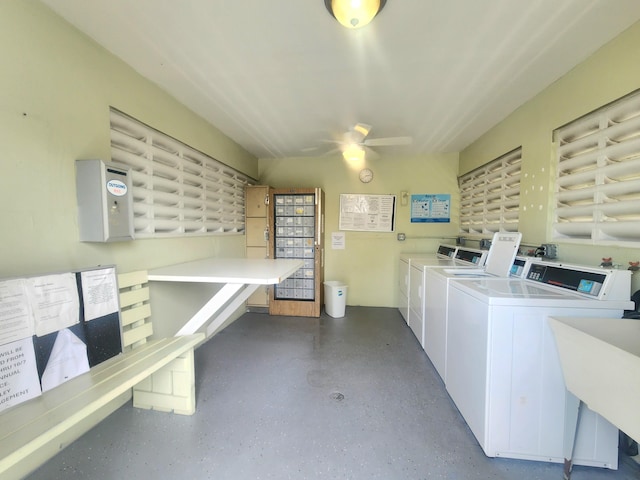 laundry area with ceiling fan and washer and dryer