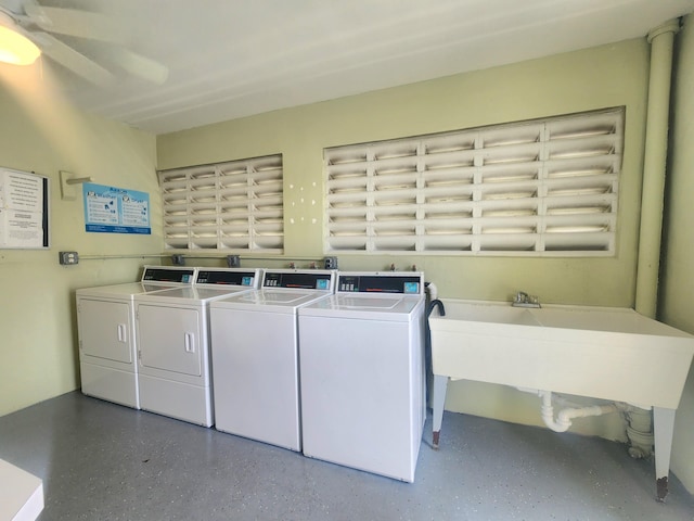 clothes washing area with ceiling fan, sink, and washing machine and clothes dryer