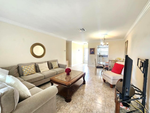 living room featuring ornamental molding and a chandelier