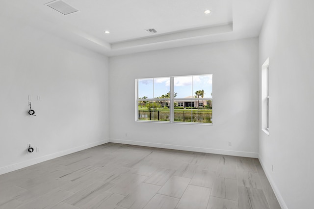 10125 Driftwood Way, Palm Beach Gardens, FL 33412 - unfurnished room with recessed lighting and a raised ceiling