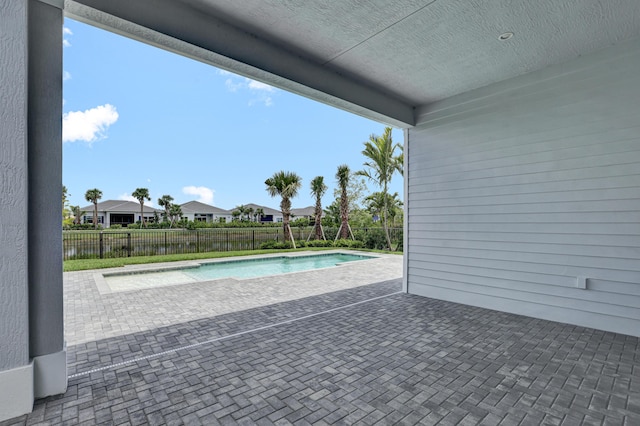 10125 Driftwood Way, Palm Beach Gardens, FL 33412 - view of pool featuring a patio area