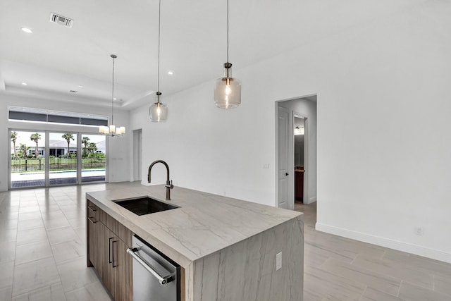 10125 Driftwood Way, Palm Beach Gardens, FL 33412 - kitchen featuring stainless steel dishwasher, a kitchen island with sink, modern cabinets, a chandelier, and light stone countertops
