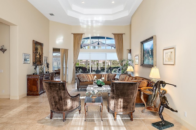 living area with a high ceiling