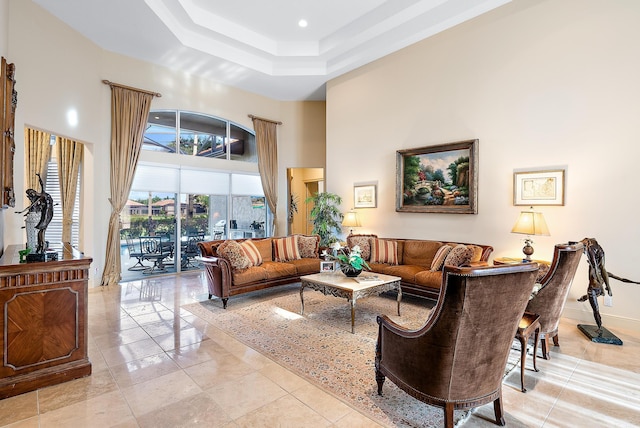 living room with a high ceiling