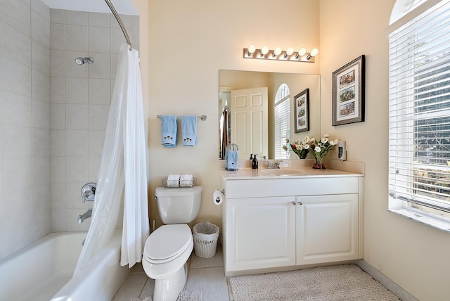 full bathroom with vanity, toilet, shower / bathtub combination with curtain, and a wealth of natural light