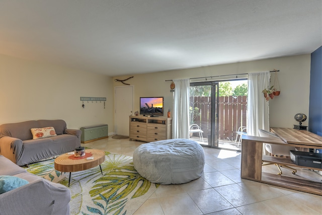 living room with light tile patterned flooring