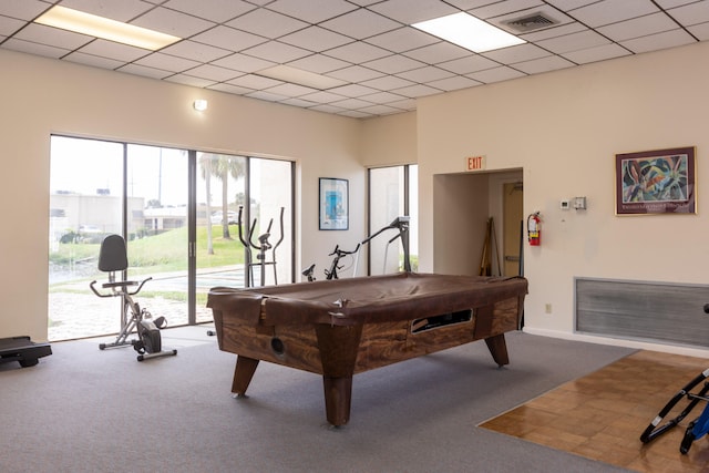 playroom with carpet, visible vents, and a wealth of natural light