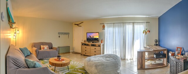 living room featuring light tile patterned floors