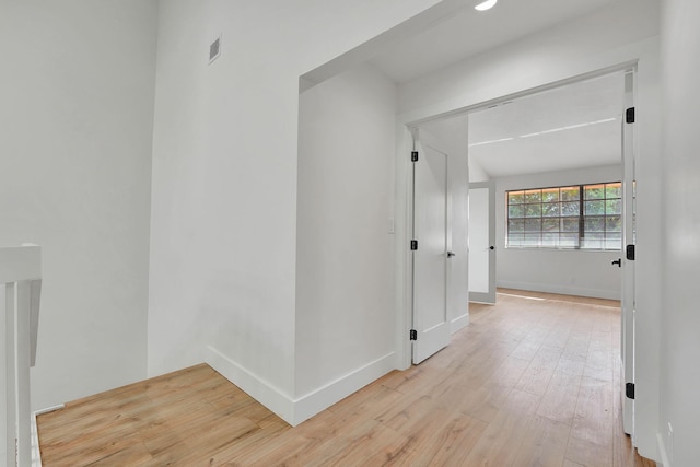 hallway featuring light hardwood / wood-style flooring