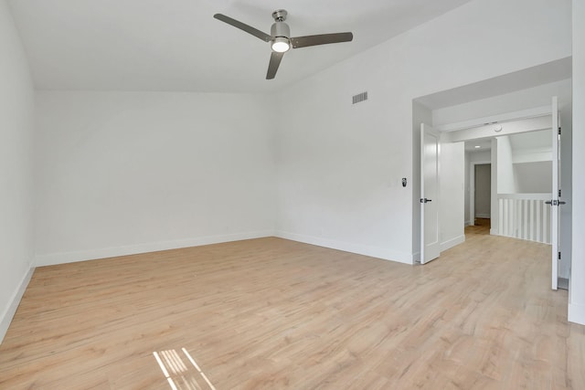 spare room with light wood-type flooring and ceiling fan