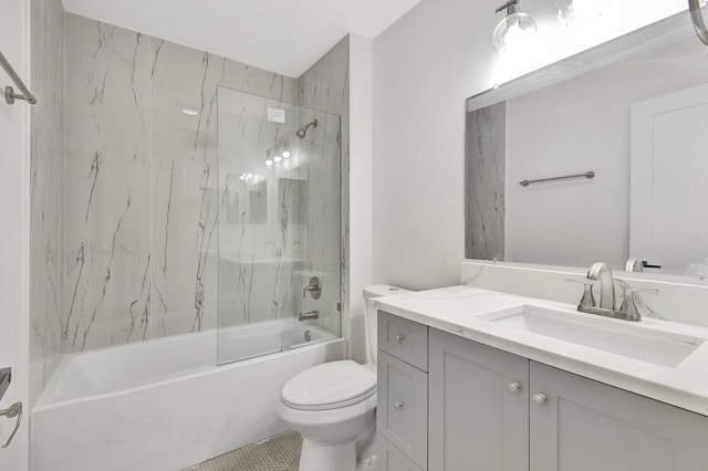 full bathroom with vanity, toilet, and tiled shower / bath combo