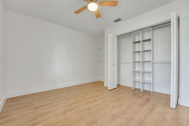 unfurnished bedroom featuring ceiling fan and light hardwood / wood-style flooring