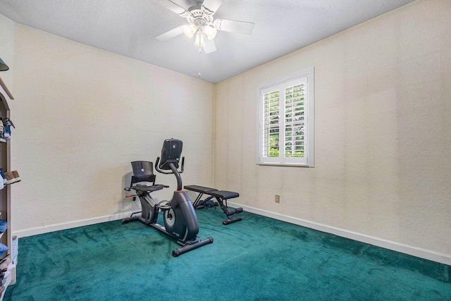 workout room featuring ceiling fan, a textured ceiling, and carpet