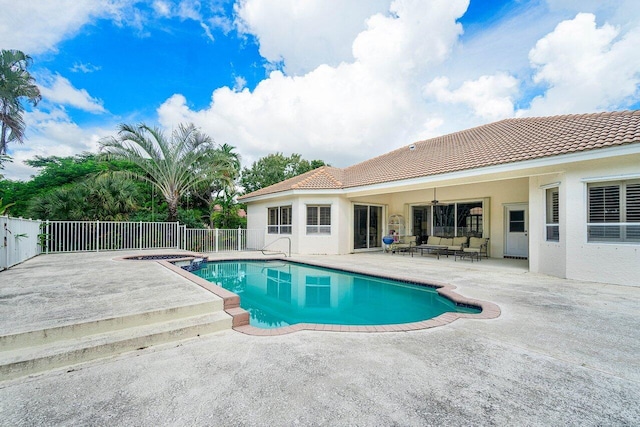 view of pool featuring a patio