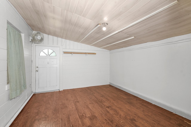 entryway featuring wooden ceiling, wooden walls, hardwood / wood-style flooring, and lofted ceiling